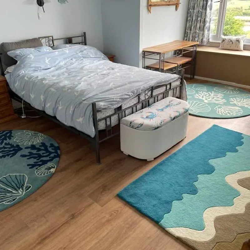 Indo Knots Coastal Sea Shell rug styled in client room